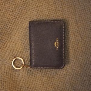 Purple COACH bi-fold wallet